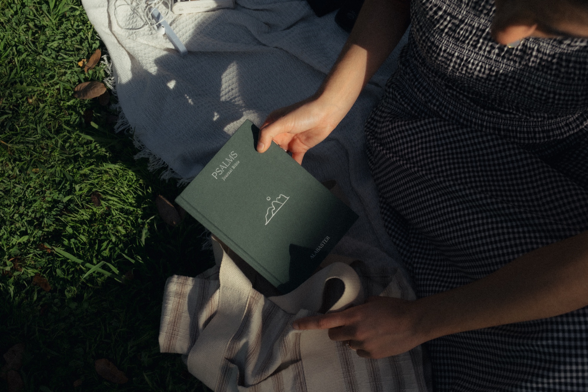 Journal Bibles: Lifestyle, Q1 2026 shoot, Psalms Journal Bible hardcover edition, tote on blanket