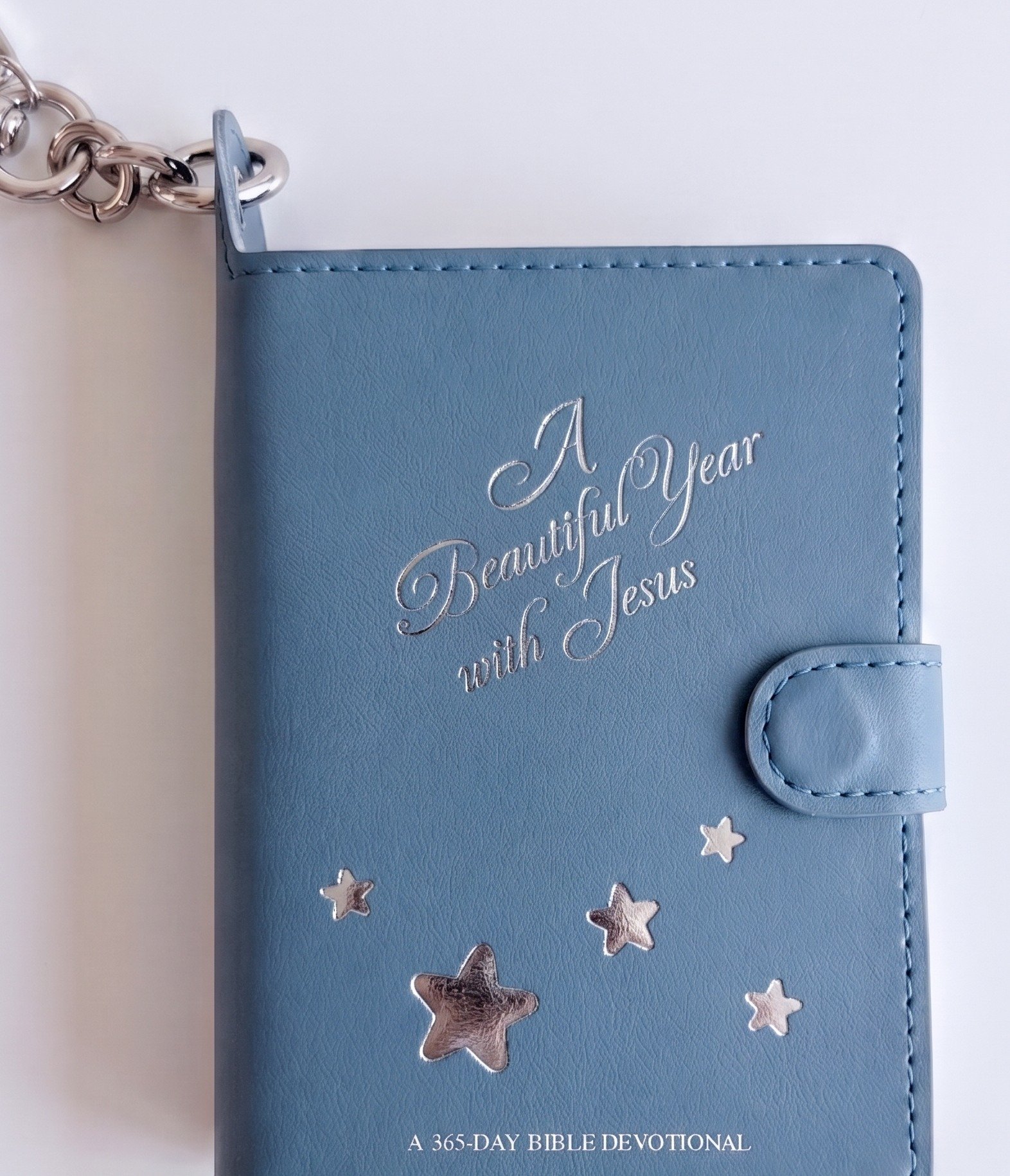 A Beautiful Year Journal, Mini: Cover concept render, blue edition with silver foil stars, strap and chain clip